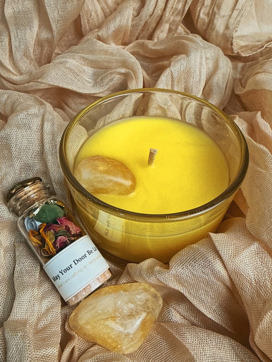 Frosted beeswax candles with citrine and a sealed spell vial